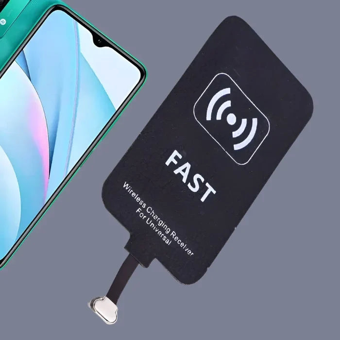 a close up of a cell phone with a fast wireless receiver attached