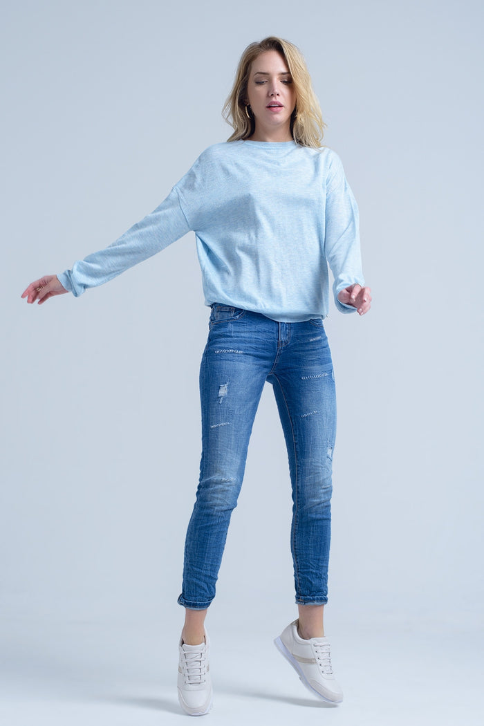 Ankle jeans with rip and repair - Denim