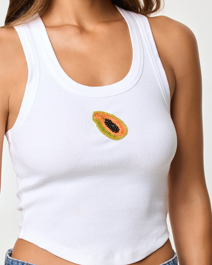 Close-up of the LSPACE Ash Tank in papaya showing the ribbed texture and neckline detail.