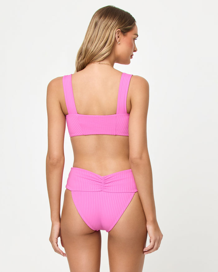 Back view of a model wearing the LSPACE Sweetheart Marlee Bikini Top and Bardot Bikini Bottom.