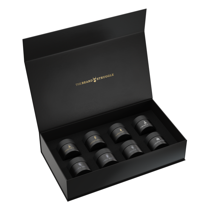 Open black sample kit box render showing eight beard balm sample jars. The Beard Struggle