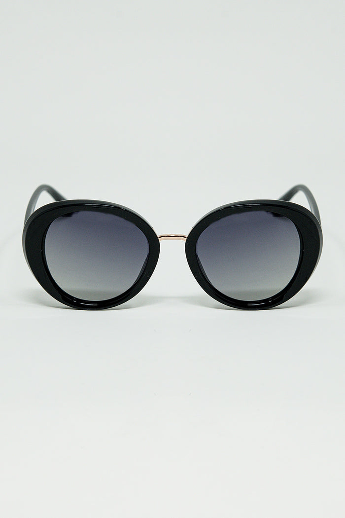 Black Oval Shaped Sunglasses with metal gold detail