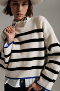 black striped jumper with blue stripe detail on the bottom