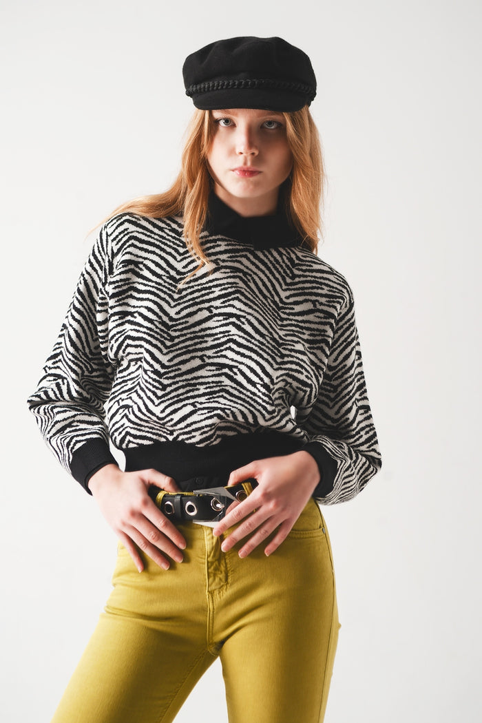 Black sweater with zebra pattern