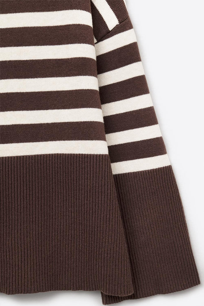 Brown oversized turtleneck sweater with white stripes and splits on the side