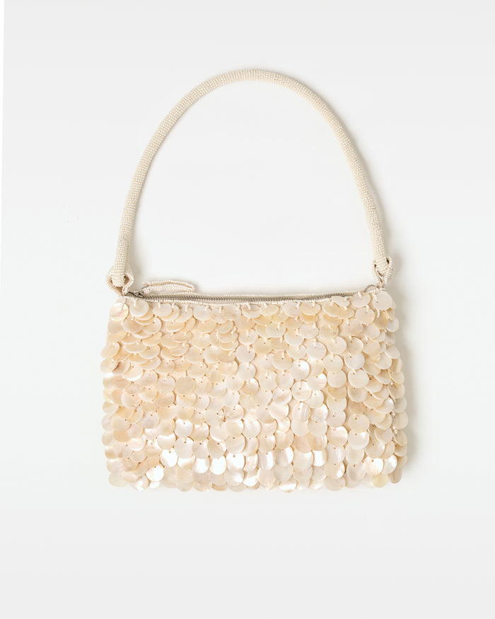 Off-model front view of the cream Campbell Bag.