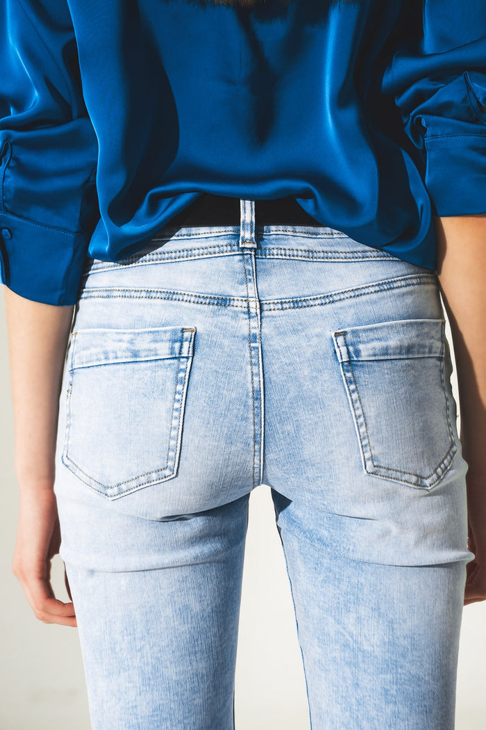 Distressed straight jeans with hem detail in blue - Denim
