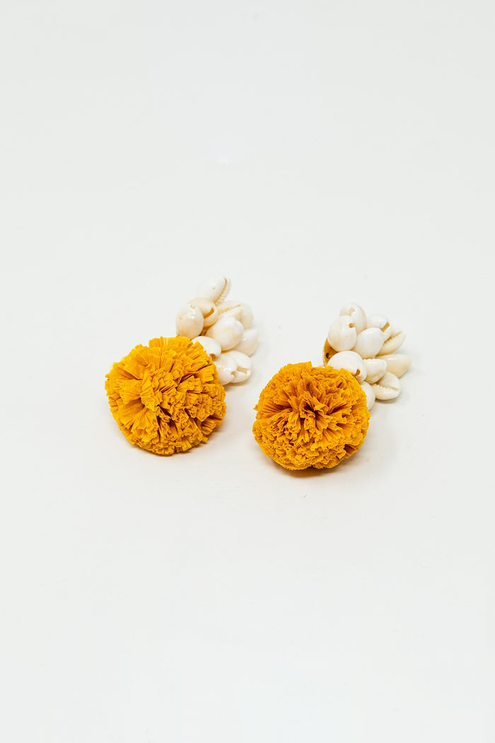 Earrings With Cream Seashells and Yellow Pom Poms
