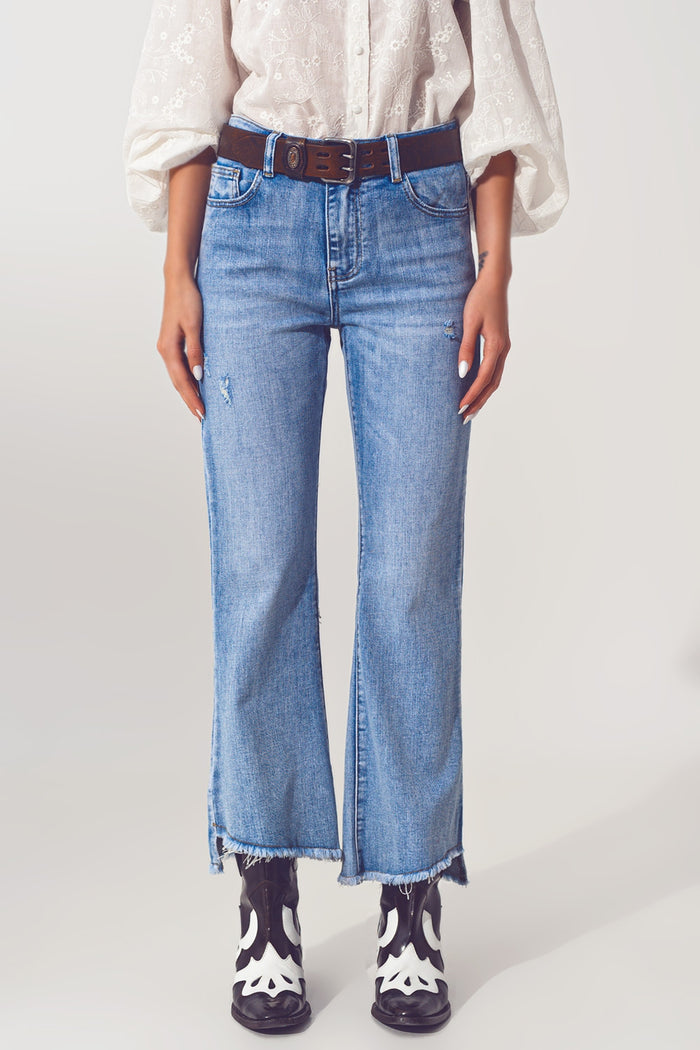 Flared Jeans in Light Blue with Asymmetric Hem - Denim