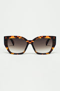 geometric polarized sunglasses with gradient dark lenses and tortoise shell