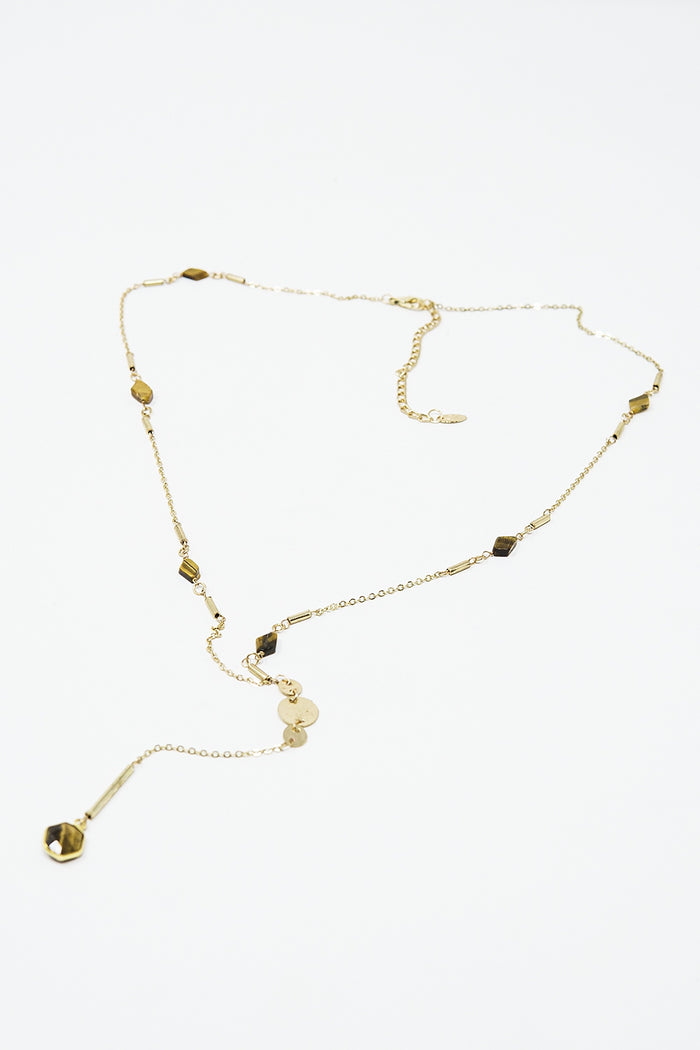 Golden necklace with stone detail and pendant