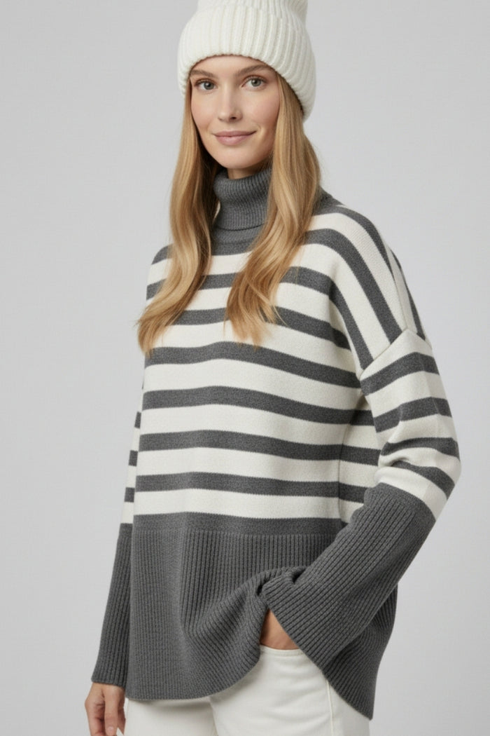 Gray oversized turtleneck sweater with white stripes and splits on the side