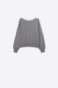 grey fine knit sweater with a boat neck and rhinestone detail