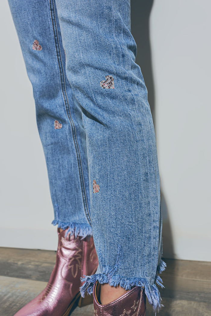 Heart Embellished Jeans with teared hem in Medium Wash - Denim