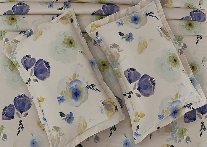 Set of cream cotton pillow covers with blue and yellow-green flower design