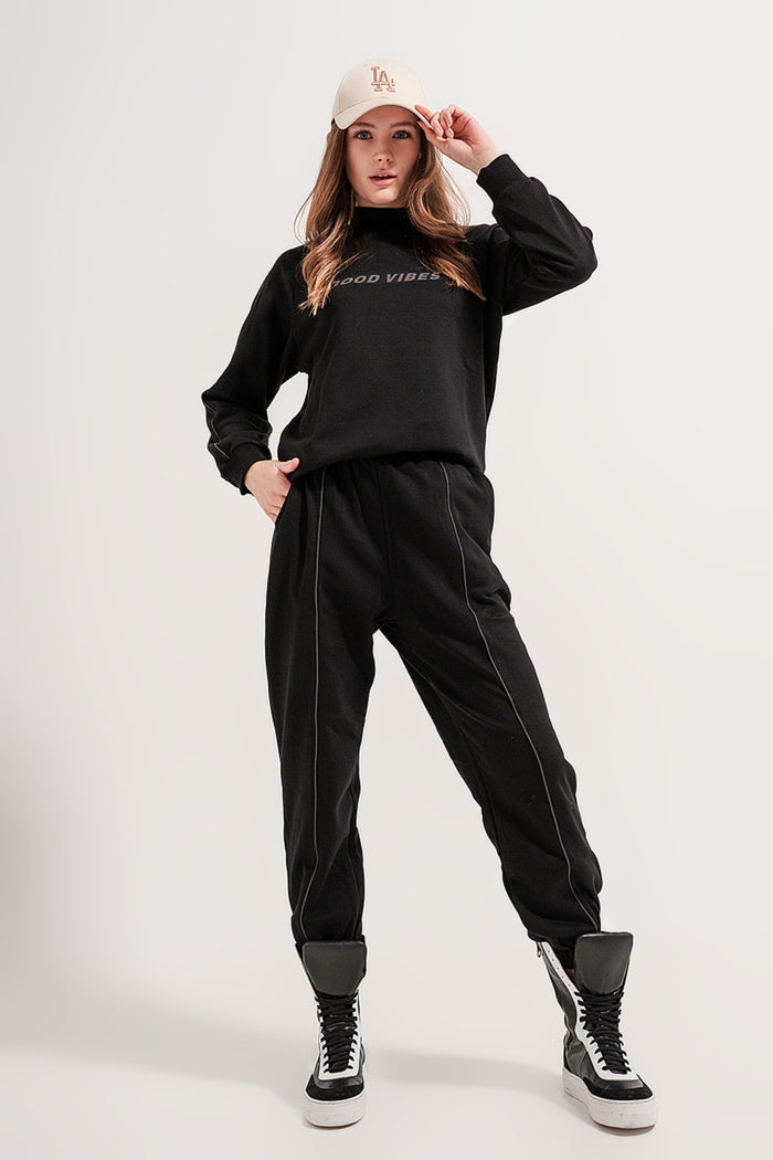Joggers with drawstring waist and front seam in black - trousers
