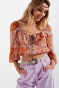 Long sleeve sheer top with shirred waist and tie detail in orange - Shirts, top