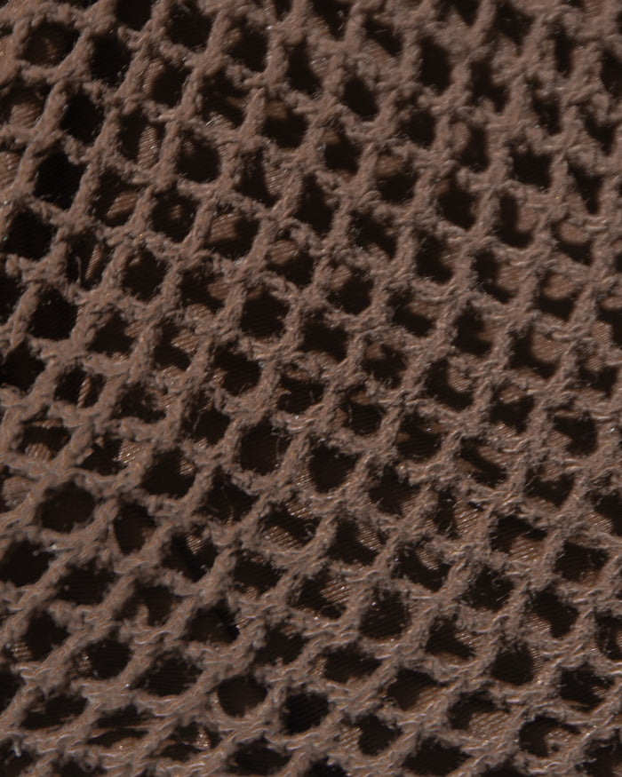 Close-up detail of the espresso open crochet mesh fabric texture of the LSPACE Mackenzie Bikini Bottom.