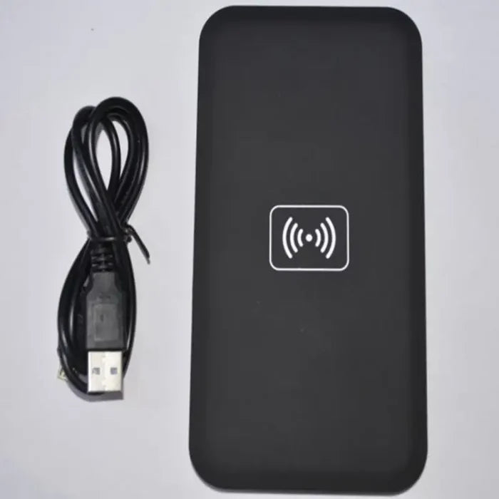 a black box with a usb and a cable