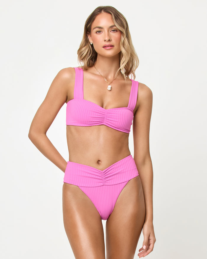 Front view of a model wearing the LSPACE Sweetheart Marlee Bikini Top and Bardot Bikini Bottom.