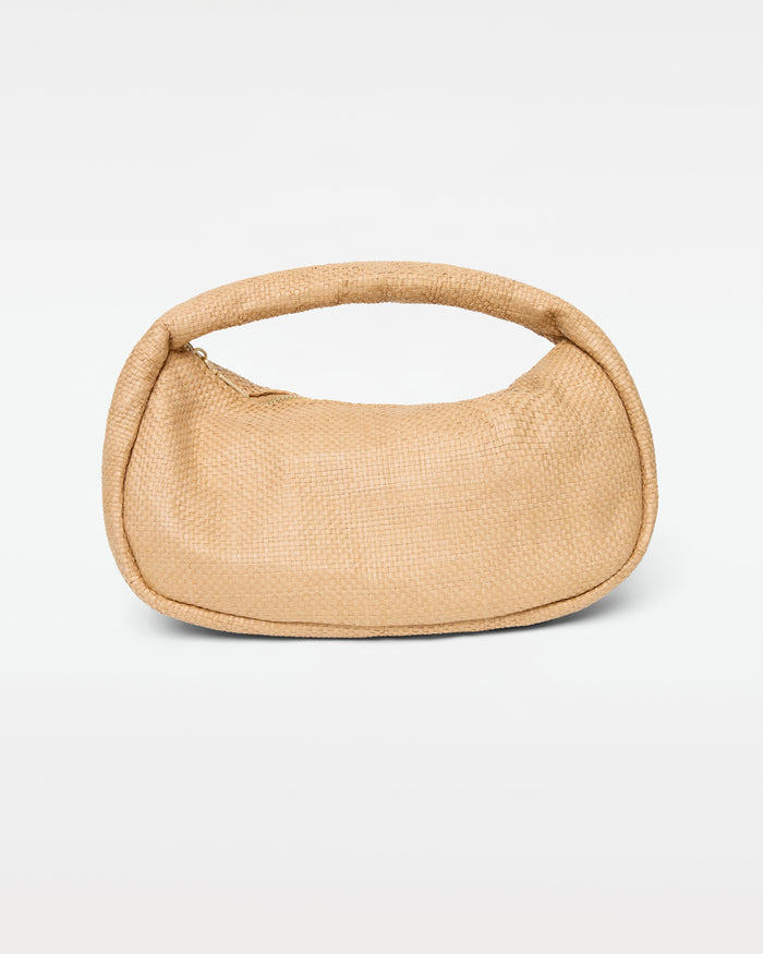Off-model front view of the Mendoza Bag in natural, a structured woven raffia crescent hobo bag with a short curved top handle and zipper closure, on a white background.