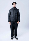 Men's black quilted bubble jacket with full-zip front and stand collar