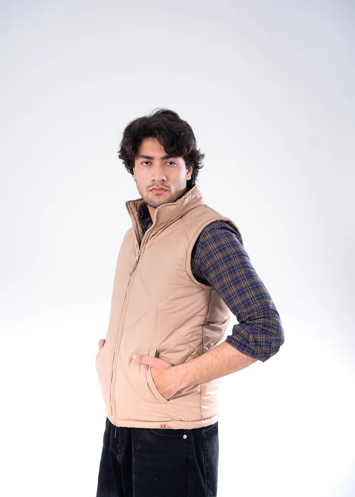 Men's beige quilted bubble jacket with full-zip stand collar, side view