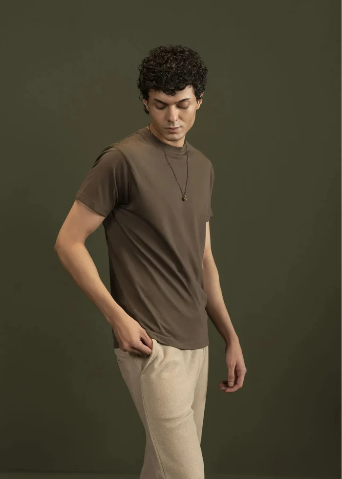 Men's olive crew-neck T-shirt with short sleeves, close-up torso view
