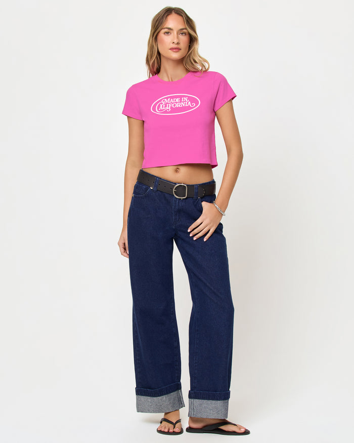 Full front view of model wearing the Merci Baby Tee in Sweetheart Made in California.