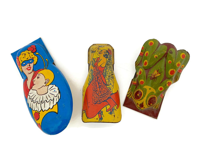 Midcentury Tin Litho Clickers at Duckwells