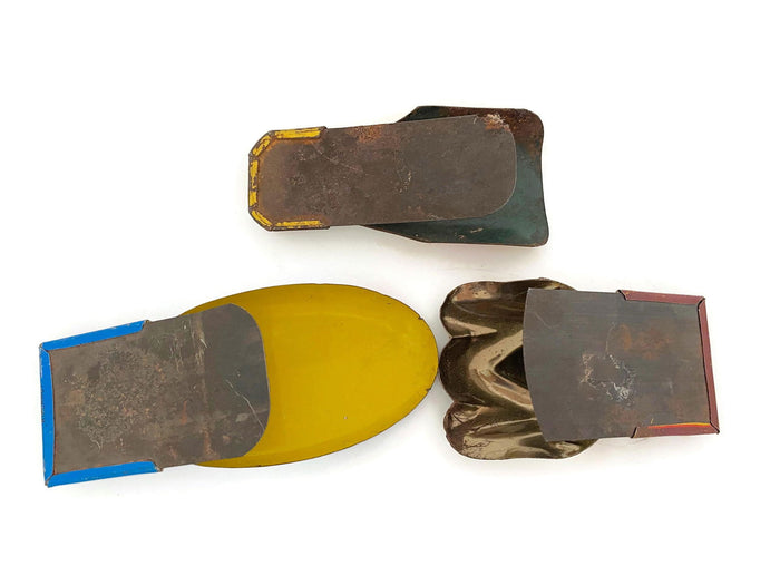 Midcentury Tin Litho Clickers at Duckwells