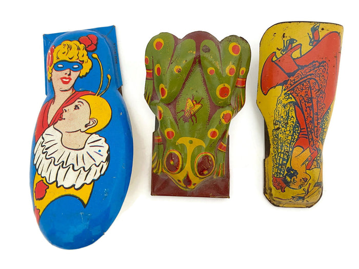Midcentury Tin Litho Clickers at Duckwells