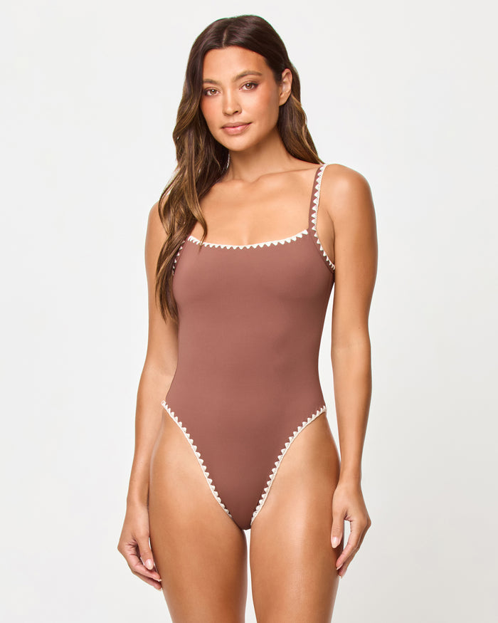 LSPACE Nadia one piece swimsuit in cafe-cream, front view on model.