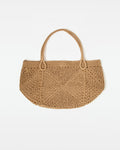 Off-model front view of the natural Paloma Beach Tote, a woven crochet bag with dual loop handles.