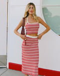 Front view of a model wearing the LSPACE Positano Top in superbloom stripe, a cropped halter top with a square neckline and red and cream horizontal stripes, styled with the matching Ravello Skirt.