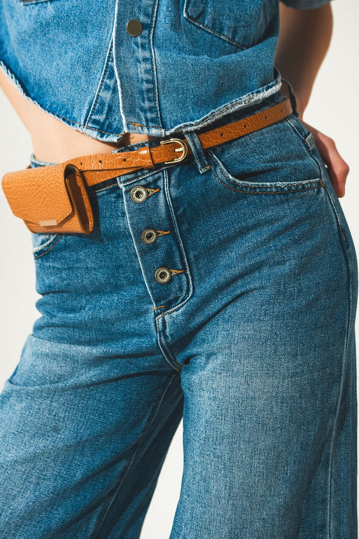 Relaxed jeans with rolled hem and exposed buttons in blue - Denim