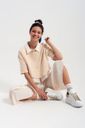 Relaxed wide leg trousers in plisse cream - trousers