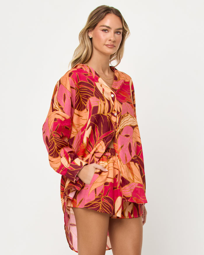 Side view of model wearing the LSPACE Rio Tunic in leaf it to me.