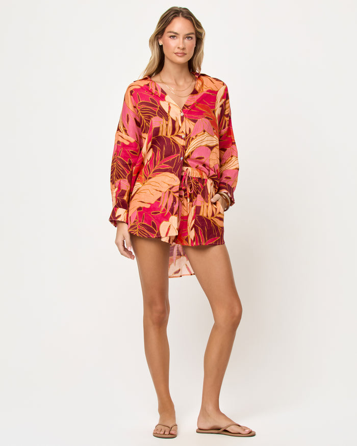 Front view of model wearing the LSPACE Rio Tunic in leaf it to me, a leaf-print open-front tunic coverup.