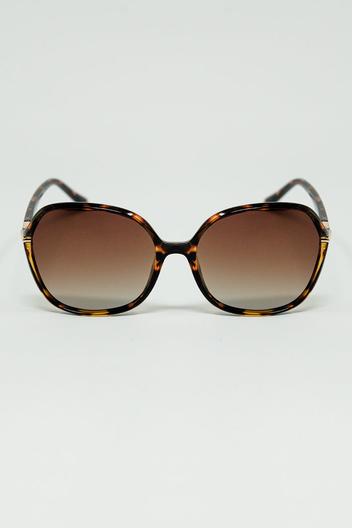 Round beige printed sunglasses with gold metal detail