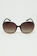 Round sunglasses in caramel color with gold metal detail