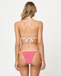 Back view of a model wearing the LSPACE lipstick red Samba Bikini Top in a red and white gingham print with white trim detail and matching Samba bikini bottom.