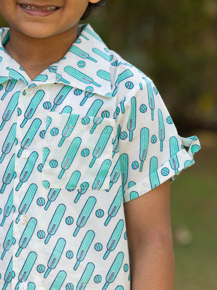 Pinklay organic cotton aqua half-sleeve shirt with bat ball pattern.