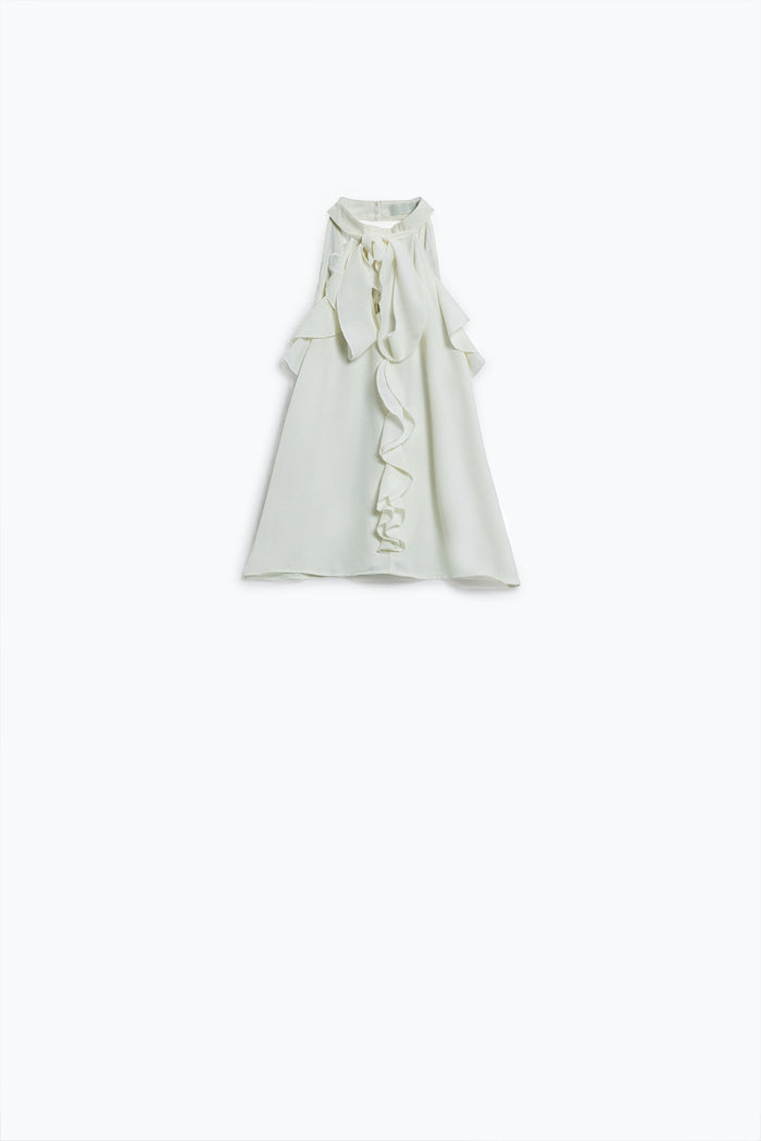 Sleeveless White Top with Ruffled Details and High Neck