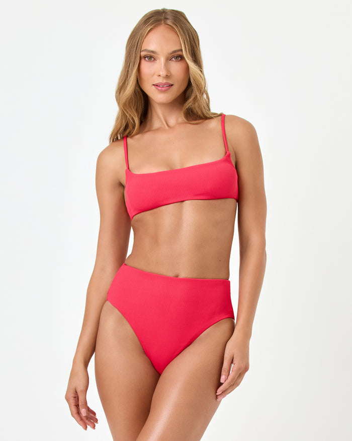 Front view of a model wearing the LSPACE pout Soleil Bikini Bottom with the Presley Bikini Top.