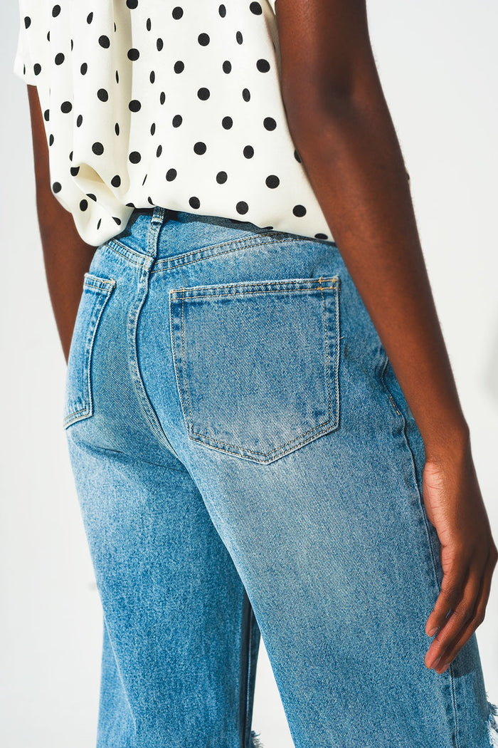 Straight jean in medium wash with rip and split hem - Denim