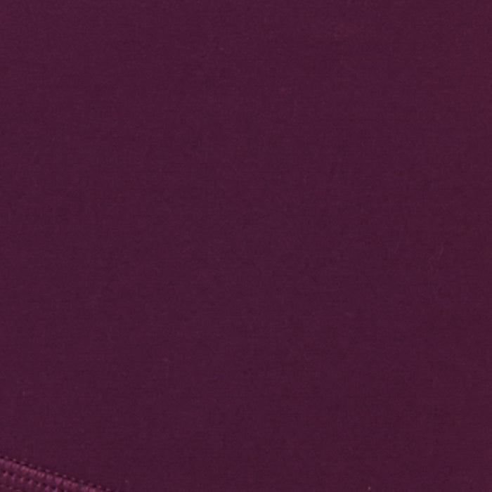 Fabric swatch for the LSPACE Stride Bra in plum, showing the plum color and fabric texture.