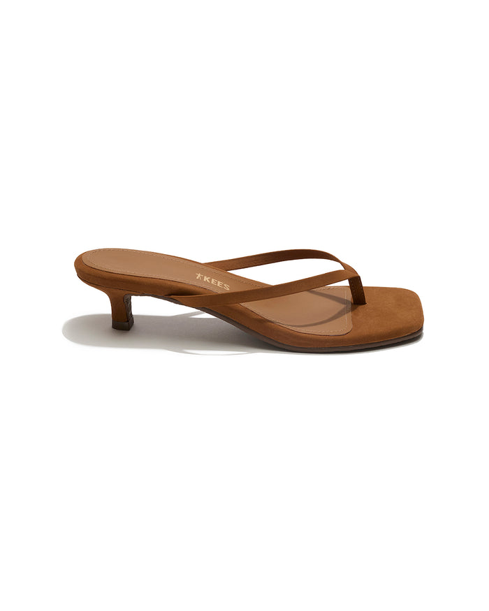 Side view of a single camel suede TKEES Square Toe Julia sandal with TKEES logo on footbed.