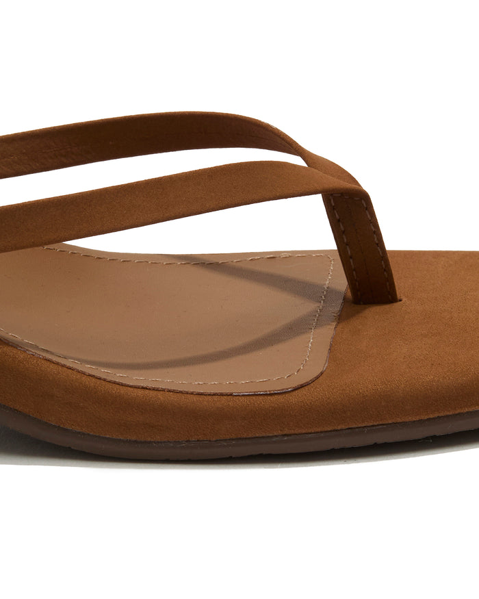 Close-up of the camel suede thong strap and square-toe footbed on the TKEES Square Toe Julia Suede.