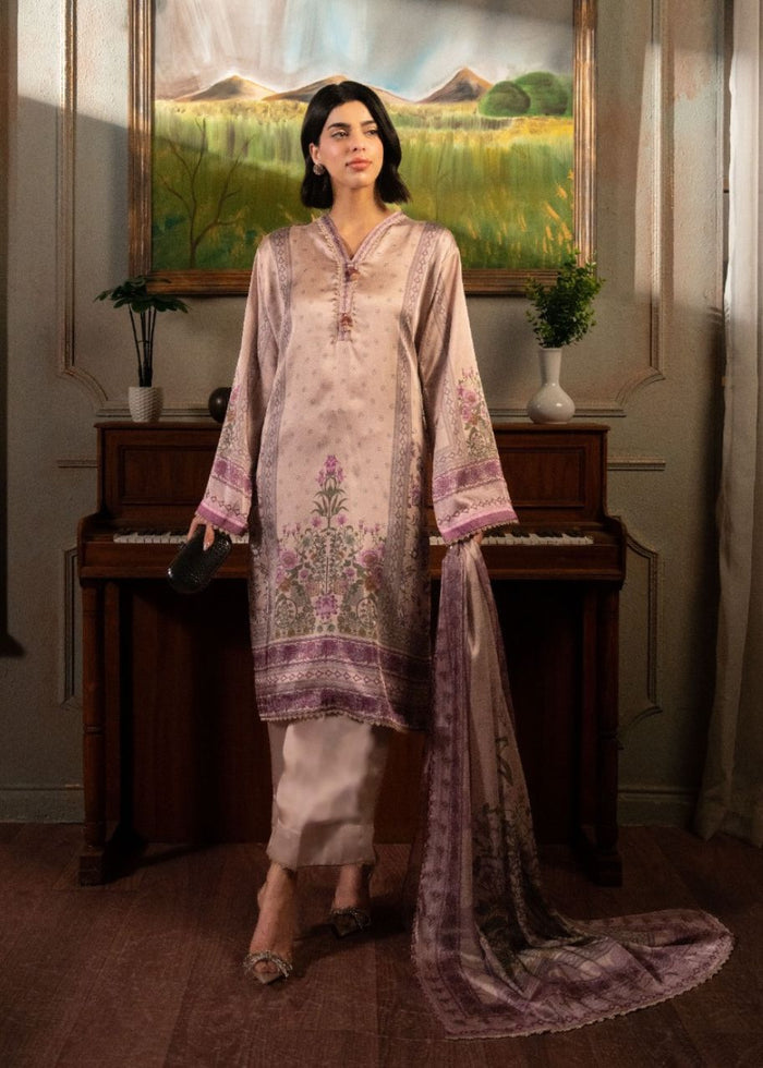 Light pink 3-piece suit with long kurta, matching pants, and purple-trim dupatta